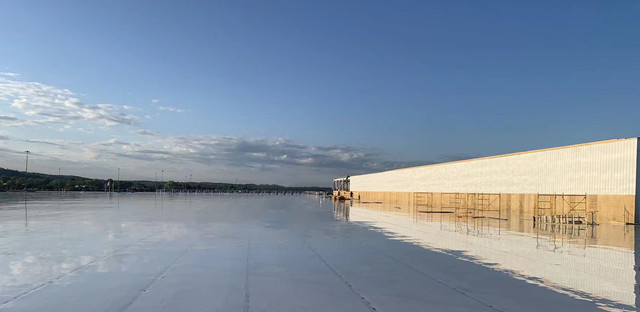 New TPO roof waterproofing and insulation system installation