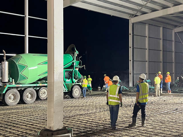Concrete floor pouring and leveling in new OH facility